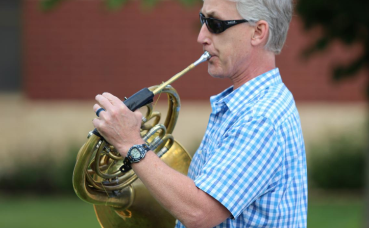 Greg Beckwith plays French horn